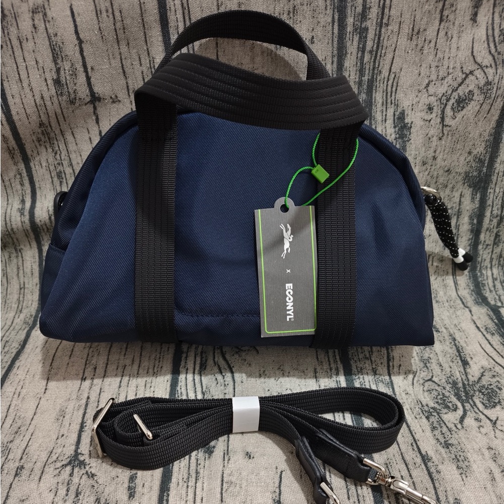 Longchamp Navy Duffel with Black Webbing Handles